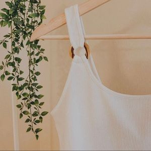 h&m bodysuit with tortoise strap detailing